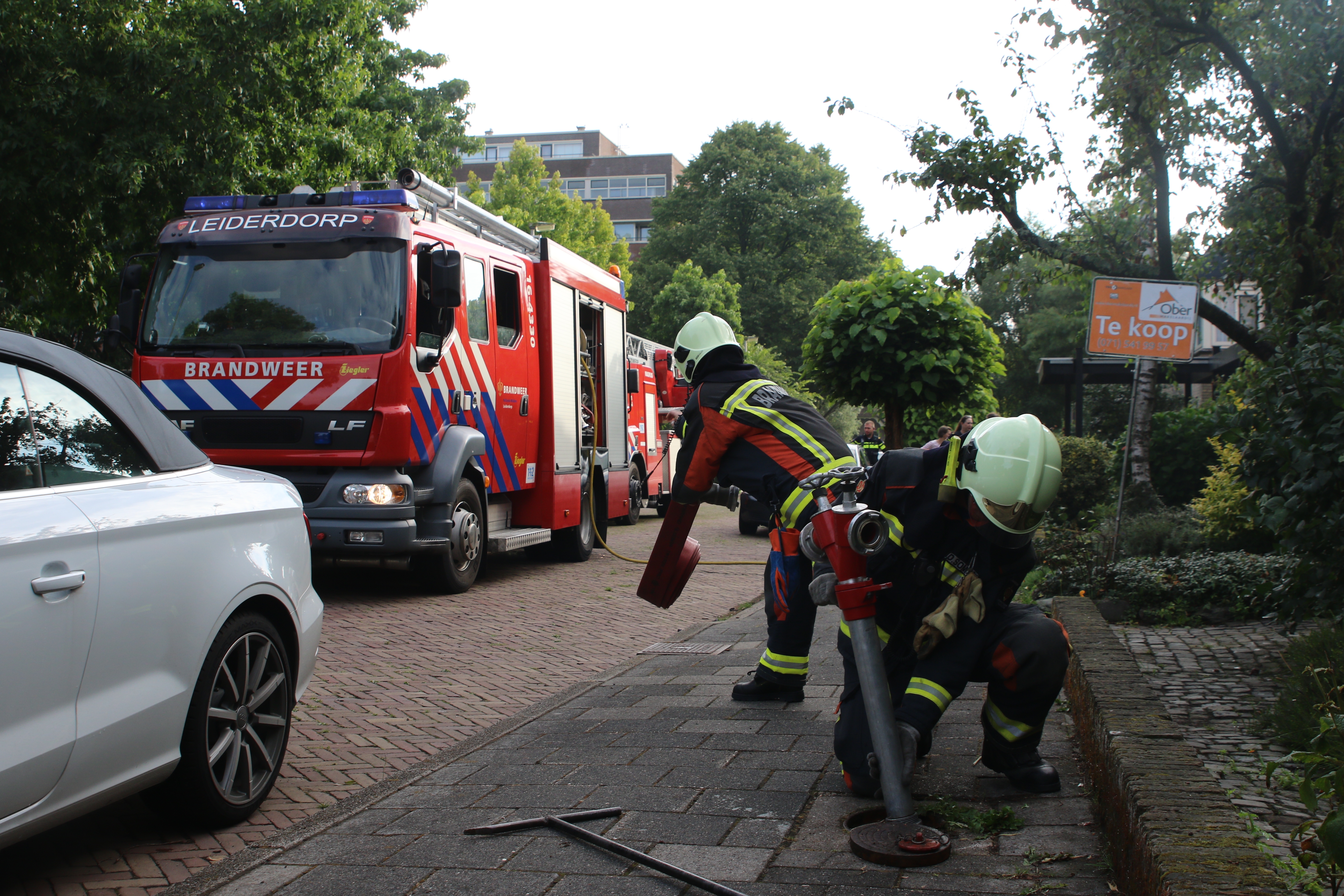 Wasdroger in de brand in een schuur, Tollenaersingel in Leiderdorp