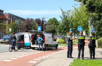 Kop-staartbotsing tussen bedrijfsbussen, Sumatrastraat in Leiden