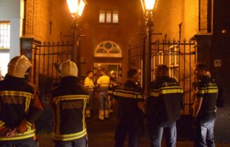 Wasmachine vat vlam in kelder, Oude Vest in Leiden
