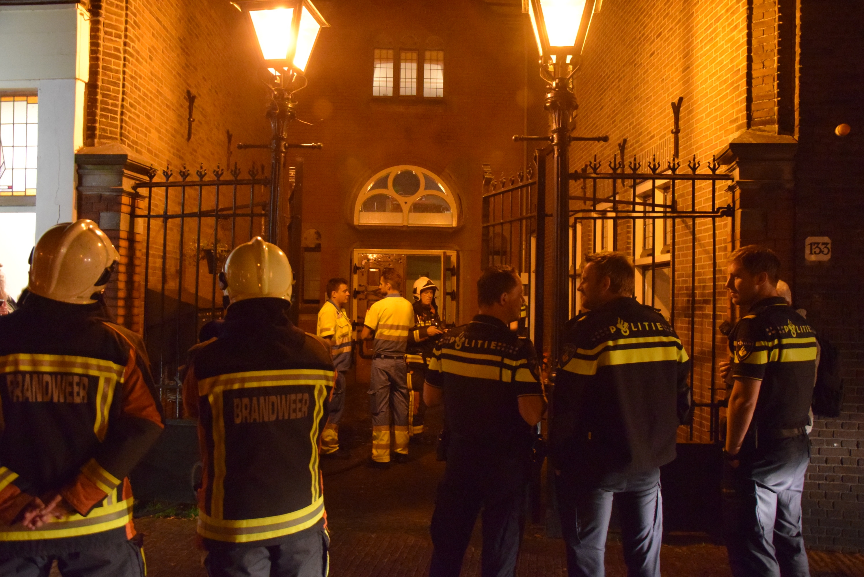 Wasmachine vat vlam in kelder, Oude Vest in Leiden