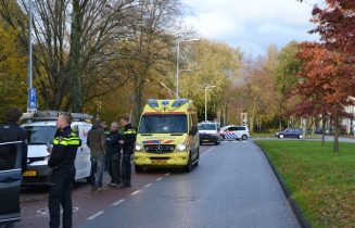 fietser tegen autodeur