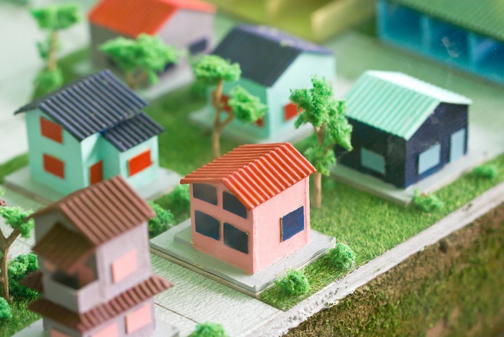 Model home on grass.